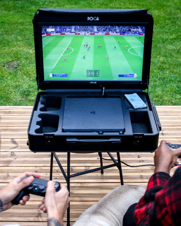 portable gaming station — POGA Pro table setup with display and controllers