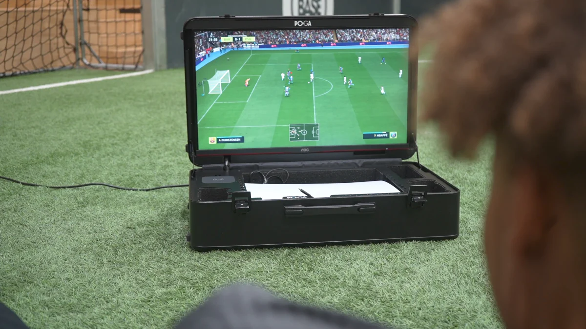 POGA portable gaming station in use on an indoor football pitch