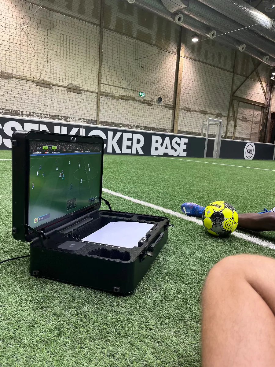 premium PS5 gaming case — POGA YEZ in action during soccer tournament gameplay